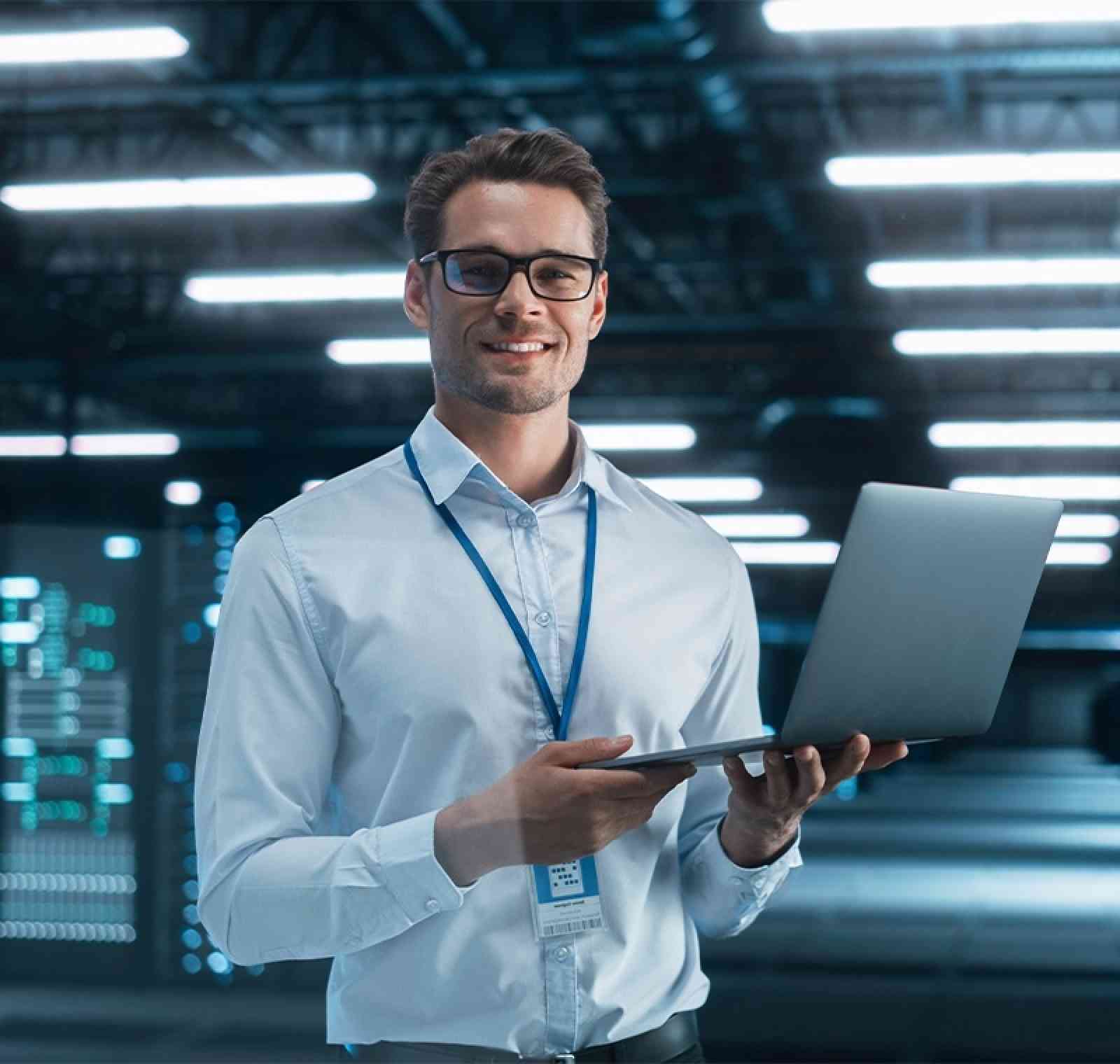 An IT security and network technician analyzes data on multiple monitors displaying network maps and security alerts, ensuring system protection and stable network performance in a modern operations center.